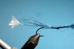 Take a small amount of blue angel hair or wing and flash the same length as the tail section, the same thing goes here don’t cut the waste just yet.