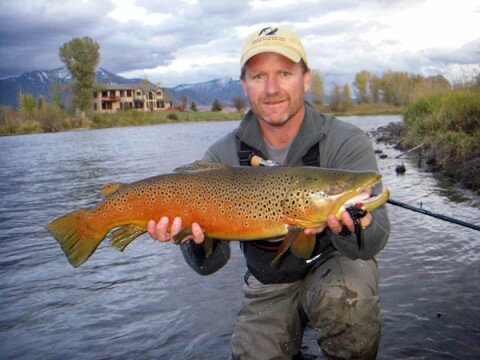 Kelly Galloup with a big brown