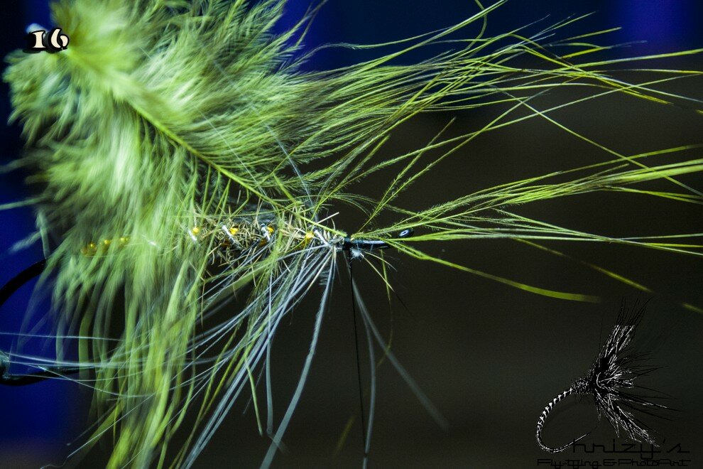 Now tie in a grizzey/olive spey hackle.