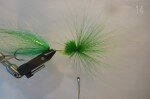 Tie in a generous clump of bucktail tips forward,make sure to spread the hairs around the shank. Make sure to use hairs fron the bottom of the bucktail since these will flare easily under thread pressure.