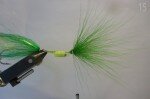 Trim of the excess bucktail, these will otherwise soak up water and make the fly heavier to cast.