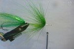 Create a cone of thread pushing the bucktail back a little bit.