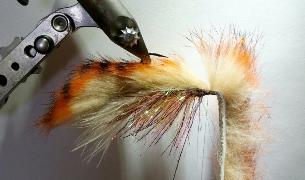 Rabbit strips: Hareline Black barred orange on tan. Run hook thru and whip finish behind hook the eye.