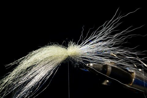 Hollow tie some craft fur/wonder fur in front of the bt. The Helsinki Spey Clave wonder fur in polar bear color is perfect for the bottom side as its totally transparent. Gray olive on top is spot on for silversides on the Hook in Cape Lookout.