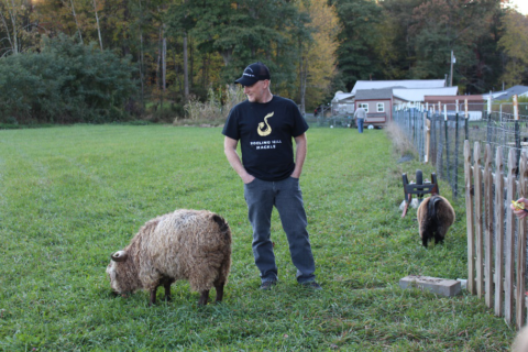 Andrew with his Pygora Goat